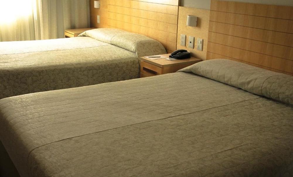 Hotel Atlantico Tower Rio de Janeiro Eksteriør billede Two beds in a hotel room